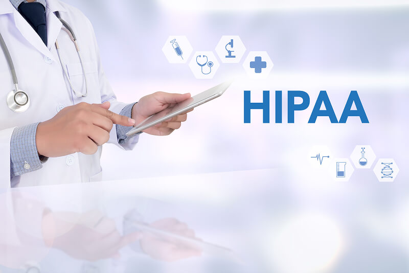 An image of a healthcare provider accessing electronic medical records to highlight HIPAA compliance.