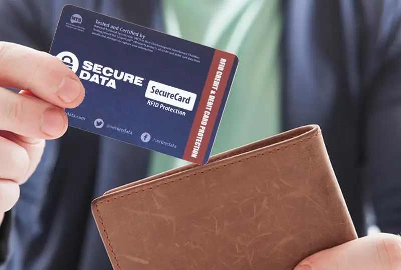 person holding wallet with SecureCard showing