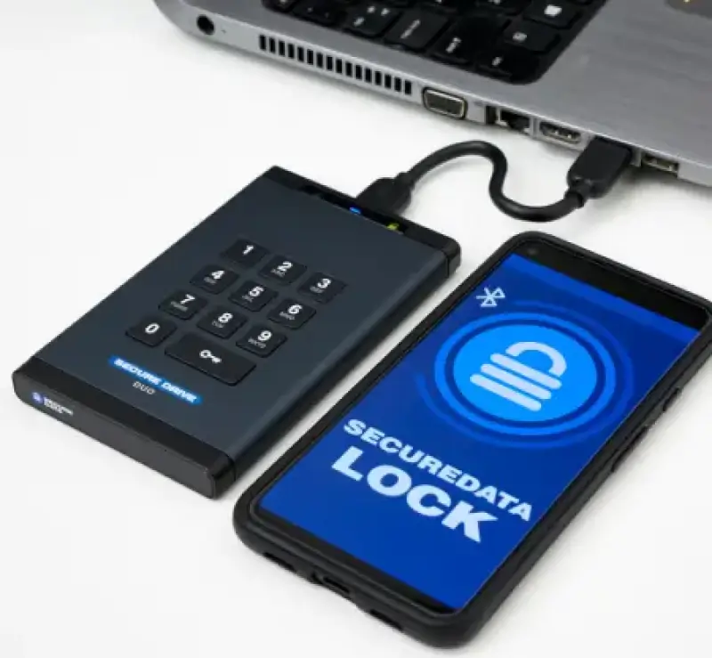 An image of a SecureDrive® connected to a laptop.