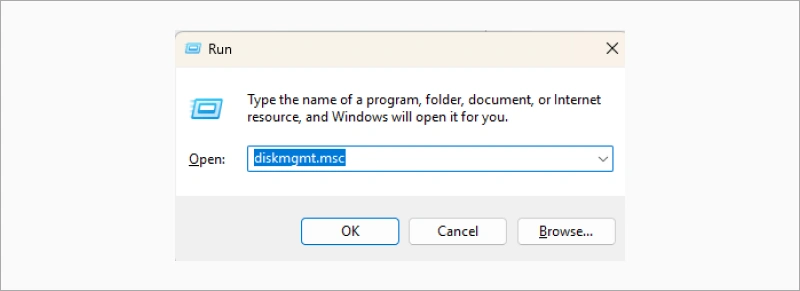 Run Windows and type diskmgmt.msc then press OK