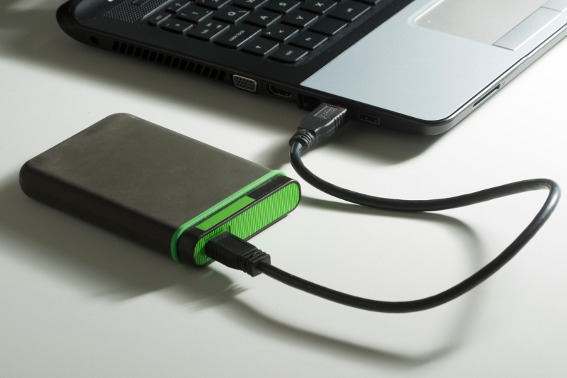 An image of an external hard drive connected to a laptop.